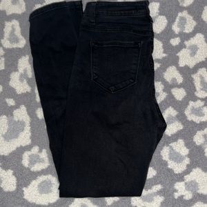 Plain black jeans.